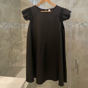 Black ruffled sleeve dress.